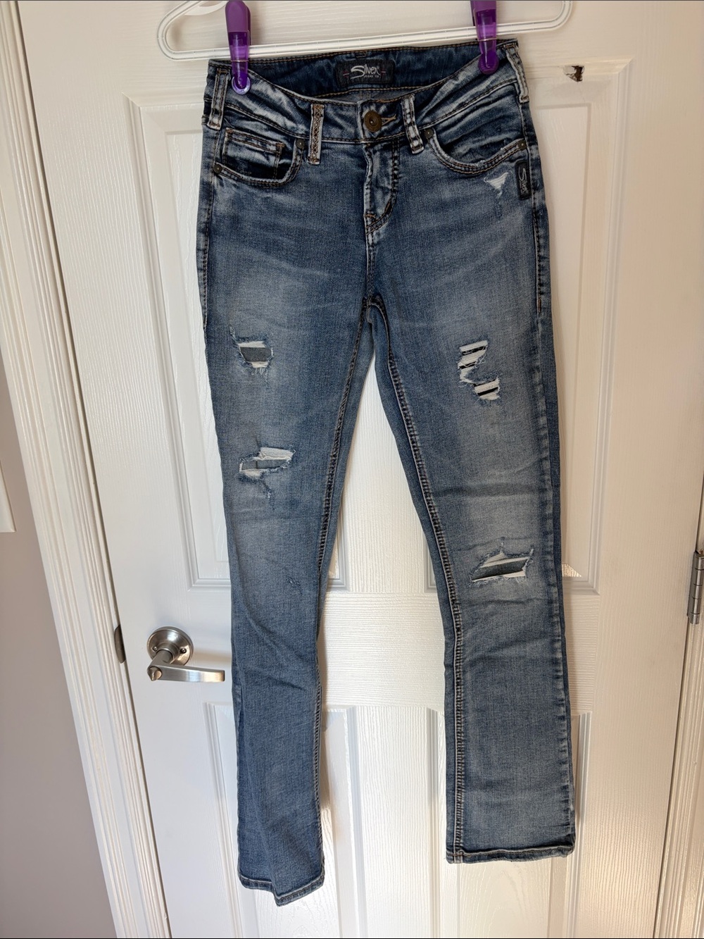 Silver Jeans Light Blue Distressed Boot Cut Jeans